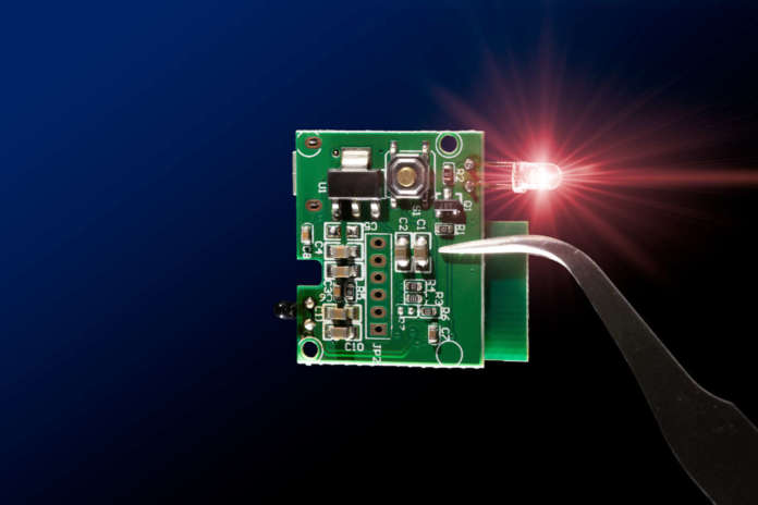 MCU circuit board with infrared led light emitting diode electronic part closeup